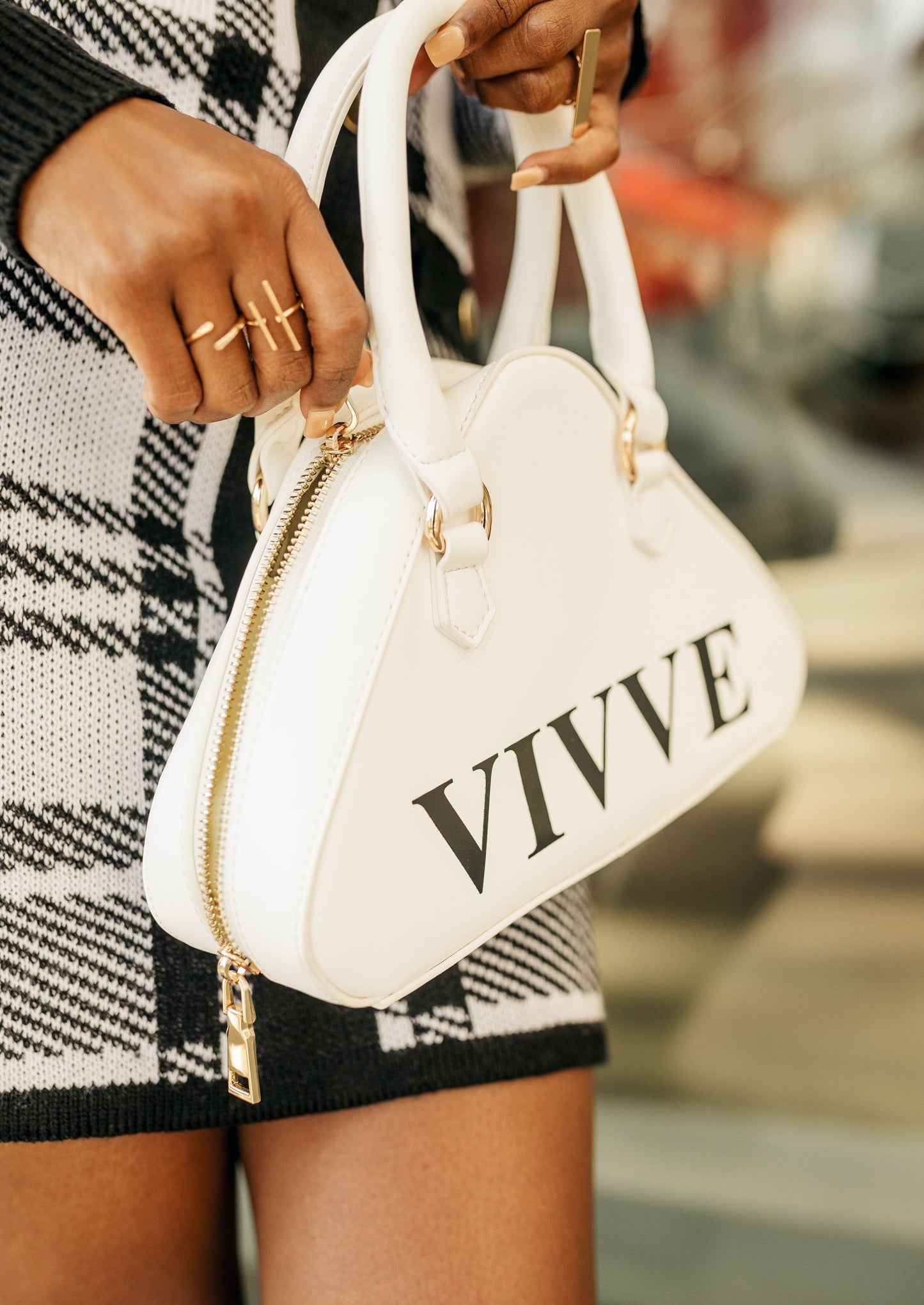 white triangle top handle handbag
