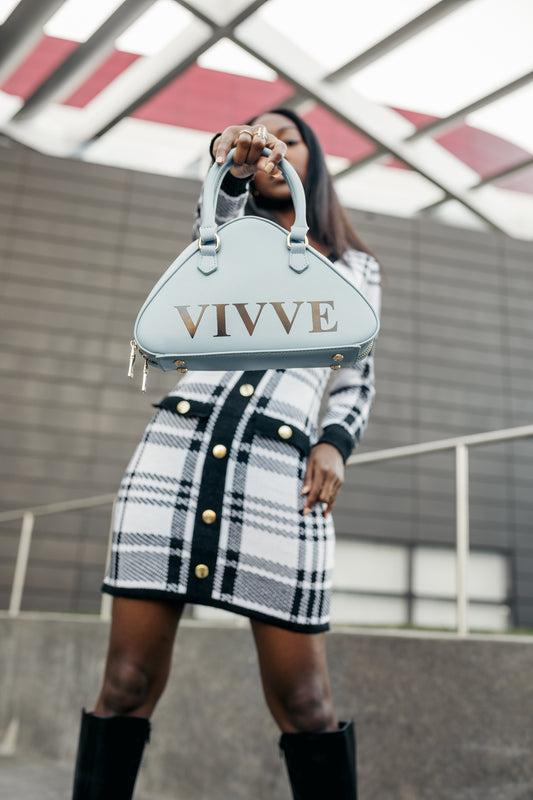 Blue top handle handbag